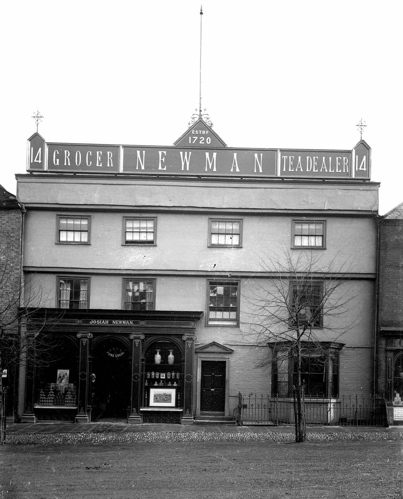 Full shot of the Newman grocer building